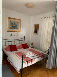 Postel nebo postele na pokoji v ubytování Apartments Stojanovic