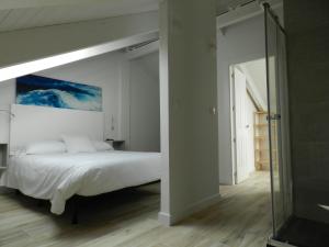 Katil atau katil-katil dalam bilik di Tu Casa en Santander