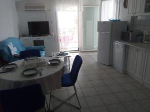 Kuchyň nebo kuchyňský kout v ubytování Apartments Rosa