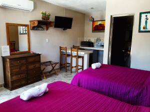 Postel nebo postele na pokoji v ubytování Holbox Isla Bonita