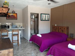 Postel nebo postele na pokoji v ubytování Holbox Isla Bonita