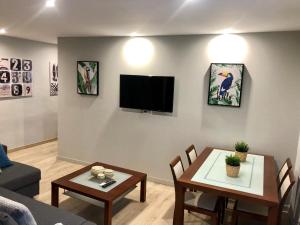 TV a/nebo společenská místnost v ubytování Apartamento San Blas-Antiguo Mercado Central