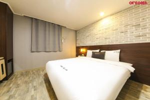 Postel nebo postele na pokoji v ubytování Ace Hotel