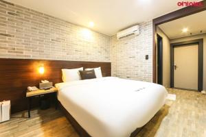 Postel nebo postele na pokoji v ubytování Ace Hotel
