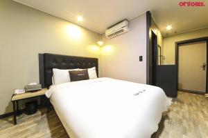 Postel nebo postele na pokoji v ubytování Ace Hotel