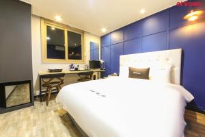 Postel nebo postele na pokoji v ubytování Ace Hotel