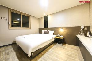 Postel nebo postele na pokoji v ubytování Ace Hotel