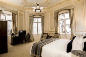 Postel nebo postele na pokoji v ubytování Hotel Casa Gangotena