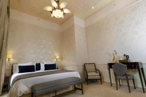 Postel nebo postele na pokoji v ubytování Hotel Casa Gangotena