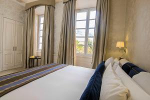 Postel nebo postele na pokoji v ubytování Hotel Casa Gangotena