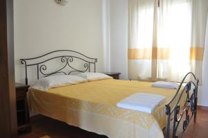 Voodi või voodid majutusasutuse Monte Pirastru toas