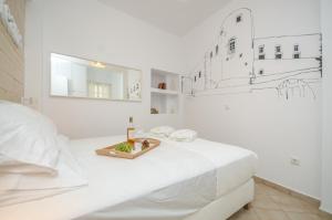 Postel nebo postele na pokoji v ubytování Lofos Apartment , Naxos Center