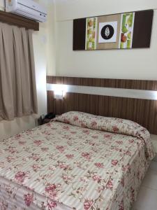 En eller flere senge i et værelse på Lacqua Di Roma Park 24 horas