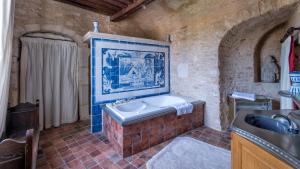Postel nebo postele na pokoji v ubytování Auberge de l'Abbatiale