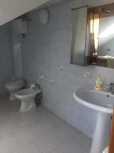 Koupelna v ubytování Casa Fara Gino