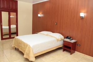 Postel nebo postele na pokoji v ubytování Hotel Alcala + 36 fotografií