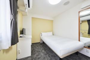 FLEXSTAY  東十條旅館房間的床