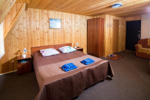 מיטה או מיטות בחדר ב-Hotel Dauria