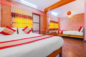 Cama o camas de una habitación en Hotel Everest Window View