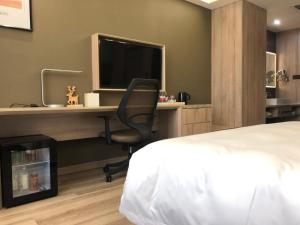 Postel nebo postele na pokoji v ubytování Atour Hotel (Dongying Huanghe Road)