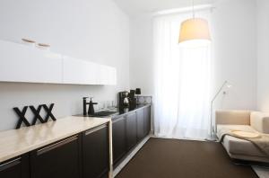 Kuchnia lub aneks kuchenny w obiekcie Valsabbion City Suite