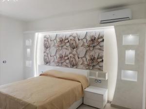 Posteľ alebo postele v izbe v ubytovaní Residence Tre Gemme