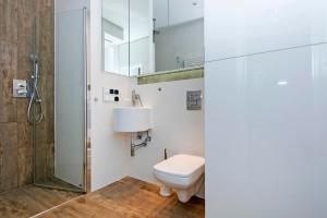 Kúpeľňa v ubytovaní Przy plaży - Neptun Park by OneApartments