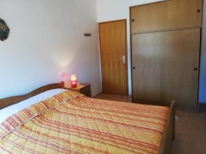 Postel nebo postele na pokoji v ubytování Apartments Ana Pogana
