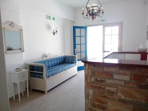 Postel nebo postele na pokoji v ubytování Hotel Faros