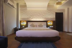 Posteľ alebo postele v izbe v ubytovaní Teeka Resort Suites & Spa
