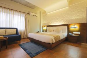Posteľ alebo postele v izbe v ubytovaní Teeka Resort Suites & Spa