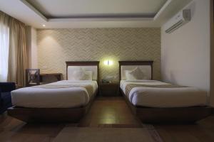 Posteľ alebo postele v izbe v ubytovaní Teeka Resort Suites & Spa
