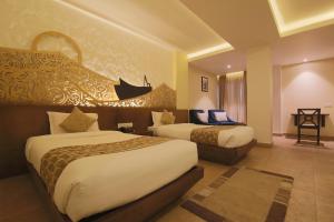 Posteľ alebo postele v izbe v ubytovaní Teeka Resort Suites & Spa