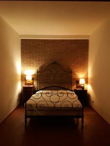 เตียงในห้องที่ Villa Biagi