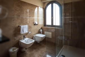 Koupelna v ubytování Hotel Del Corso + 30 fotografií