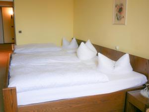 Postel nebo postele na pokoji v ubytování Hotel Oronto