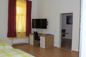 TV a/nebo společenská místnost v ubytování Apartment Fonhauser