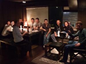 a group of people sitting in a room at International Guesthouse Azure Narita in Narita