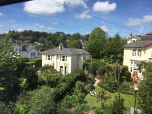 a view of a house with a garden at Acorn Lodge in Torquay