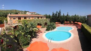 an aerial view of a resort with a swimming pool at Residence Baia Infreschi in Marina di Camerota
