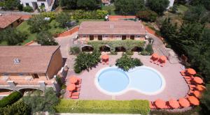 an aerial view of a house with a swimming pool at Residence Baia Infreschi in Marina di Camerota