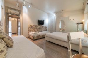 Un ou plusieurs lits dans un hébergement de l'établissement Nina Casetta De Trastevere