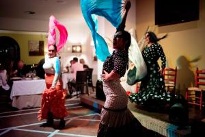 a group of women dancing in a room at Ona Alanda Club Marbella in Marbella