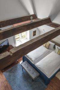 Postel nebo postele na pokoji v ubytování meinsachsenwald forsthaus friedrichsruh