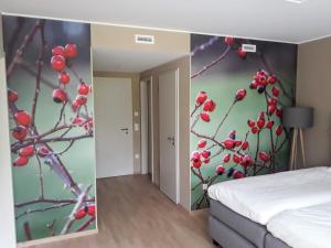 Una cama o camas en una habitación de Péitche Lauer