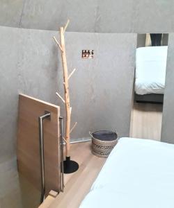 Una cama o camas en una habitación de Péitche Lauer