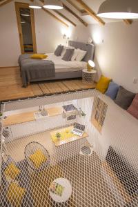 Postel nebo postele na pokoji v ubytování Apartments Kantunal