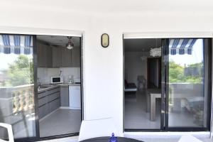 Kuchnia lub aneks kuchenny w obiekcie Appartement exceptionnel confortable bord de mer