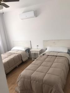 Posteľ alebo postele v izbe v ubytovaní Casa Cesar Martinell 1