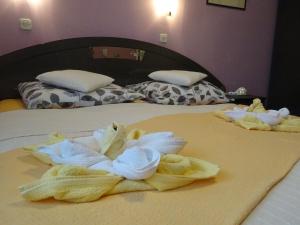 Posteľ alebo postele v izbe v ubytovaní Apartman Iris s terasom